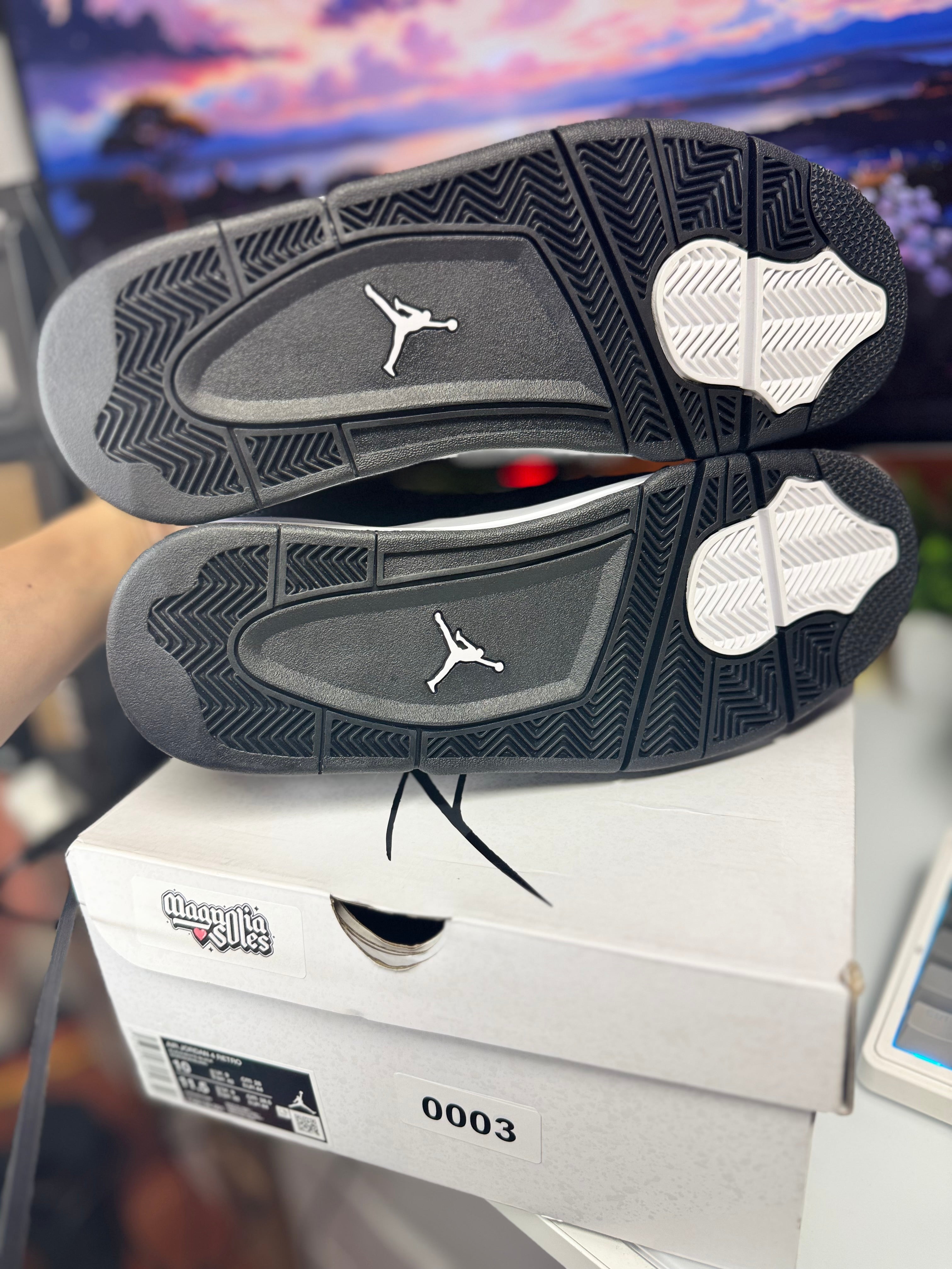 "White Thunder" Air Jordan Retro 4