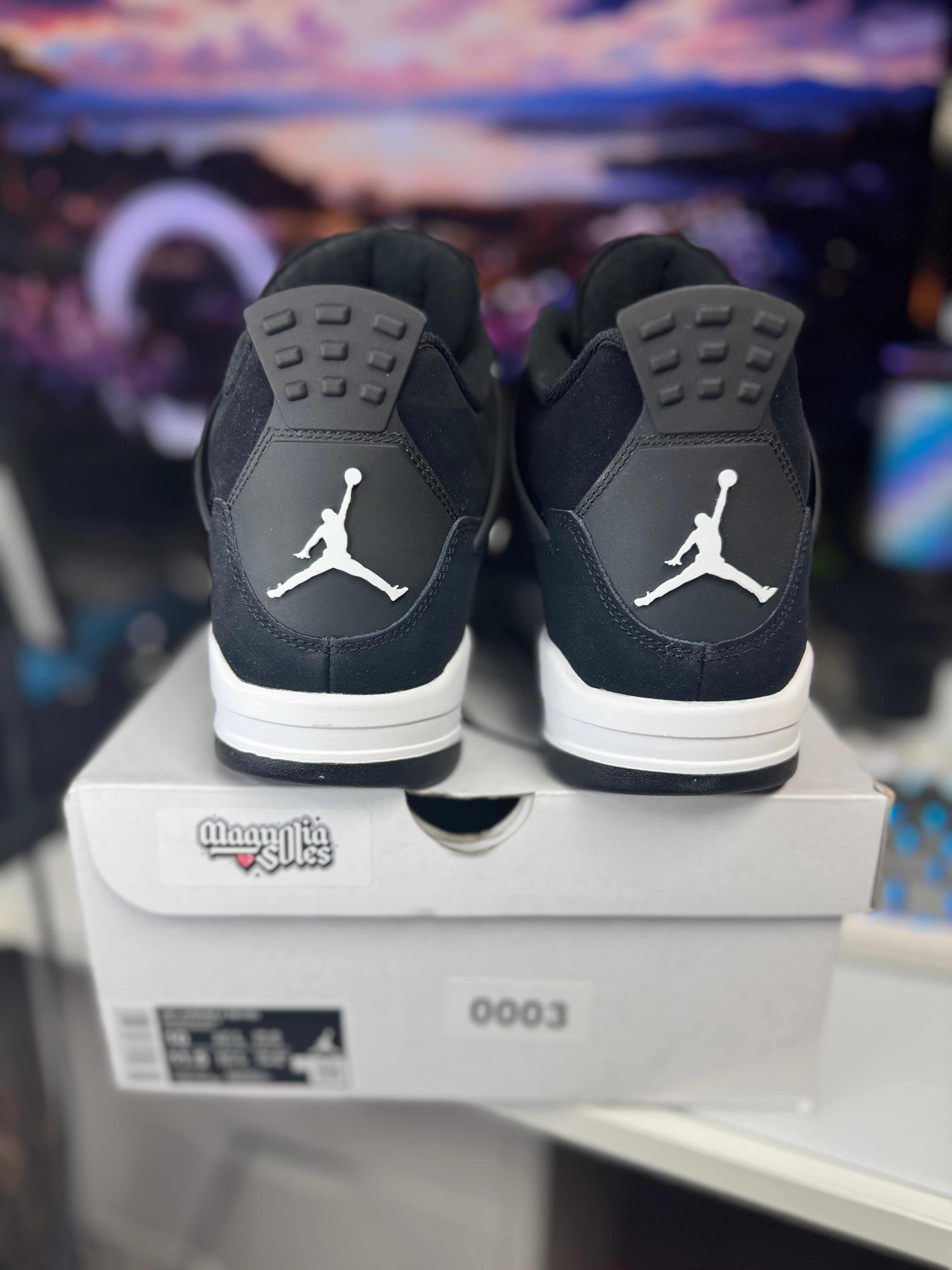 "White Thunder" Air Jordan Retro 4